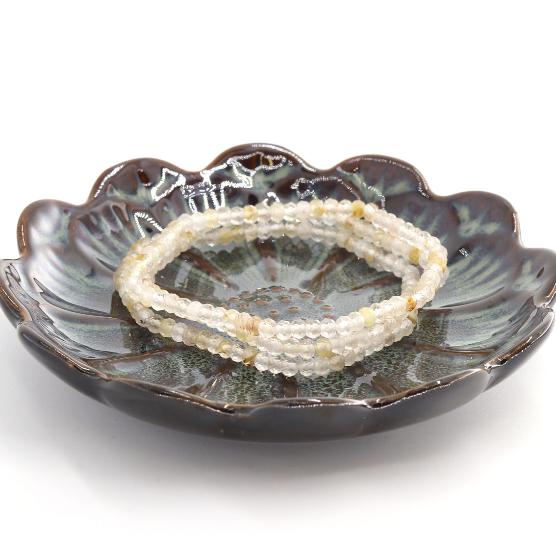 Quarzo rutilato sfaccettato. Bracciale rondelle 4x3mm 