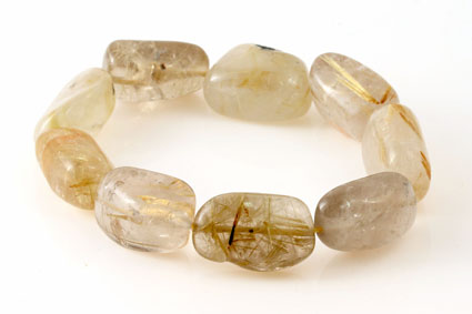 Bracciale di pietre burattate di quarzo rutilato di circa 16-24 mm