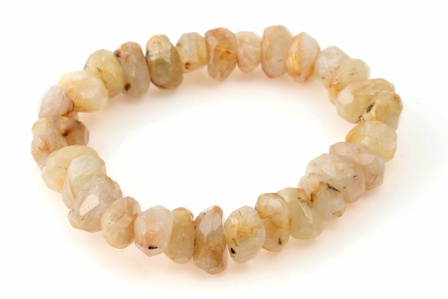Quarzo rutilato sfaccettato. Bracciale di nuggets 15x20 mm